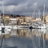 Sailboats moored in the old harbour of Golfe-Juan